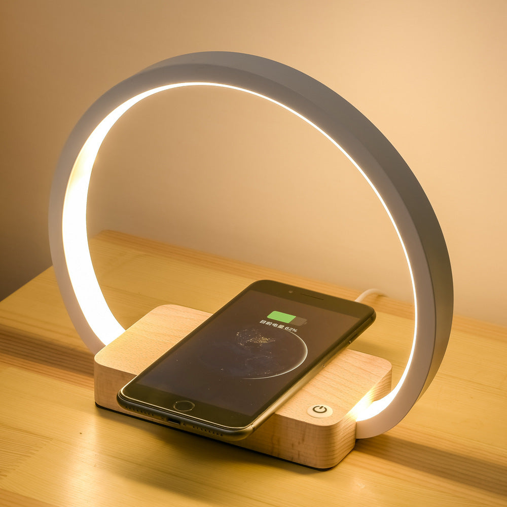 Round multifunctional bedside table lamp with USB charging and metal shade