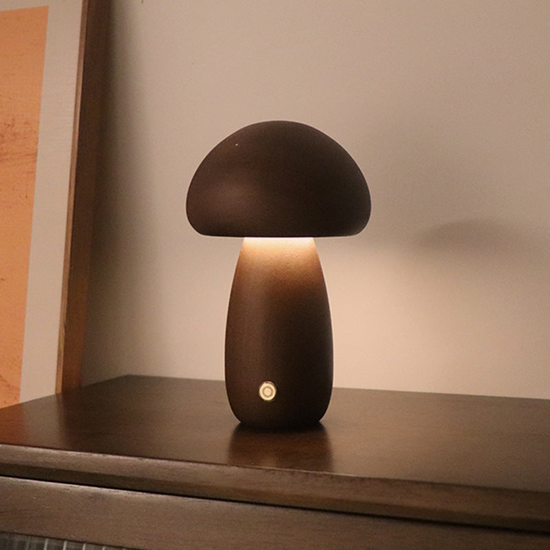 Cute wooden mushroom LED night light with touch switch for children's room.