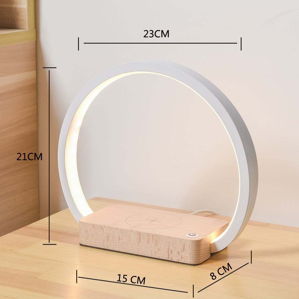 Round multifunctional bedside table lamp with USB charging and metal shade