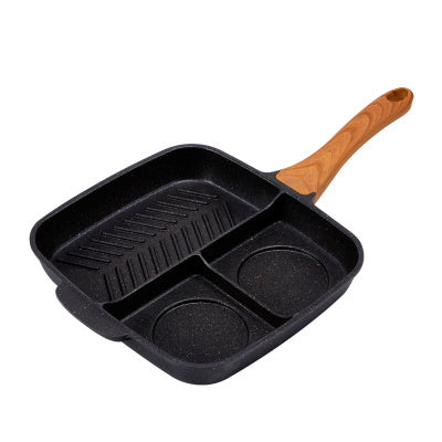 Non-stick Maifanshi pan with separated areas for frying steak and making omelettes.