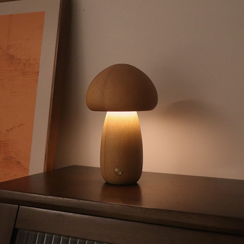 Cute wooden mushroom LED night light with touch switch for children's room.